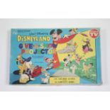 A Chad Valley Walt Disney “Disneyland” Give-A-Show projector, boxed.