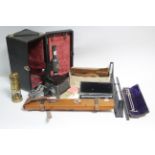 A Bakers of London student’s microscope, cased; & various other instruments.