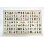 A large coloured print “Official Badges of The British Army, Now In Daily Use”, 23¼” x 34¾”,