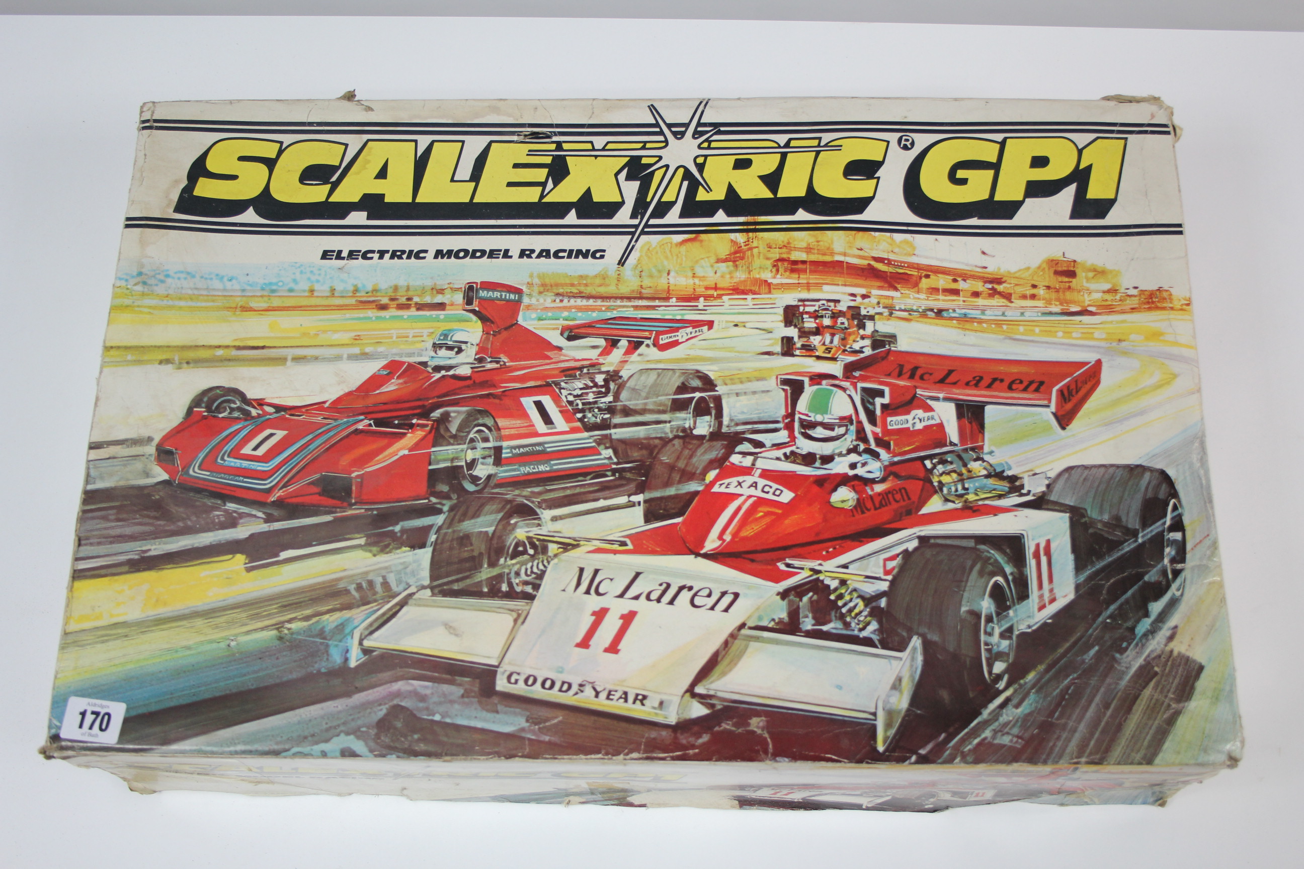 A Scalextric “GP1” racing car set; an MB “Cross Fire” game; & a Lego Technic “Power Functions”