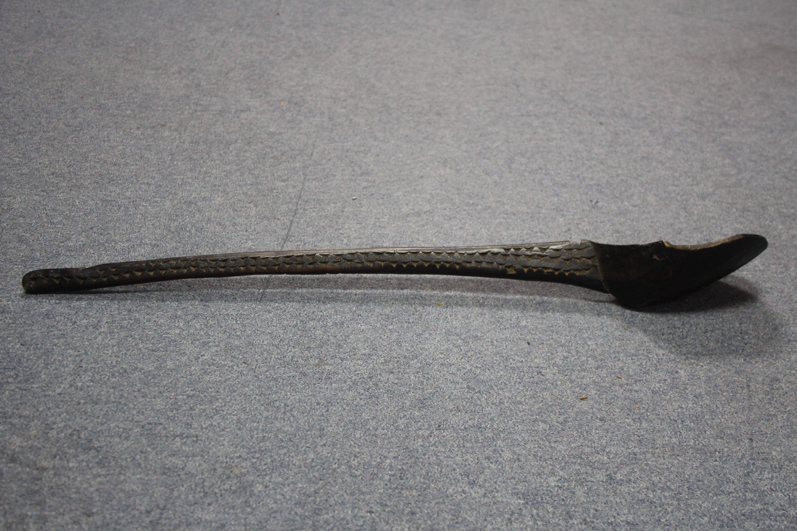 An African carved wood long-handled ladle with shaped bowl; 30" long. - Image 2 of 2