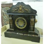 A late Victorian black slate and marble cased mantel clock with neo-classically inspired bronze