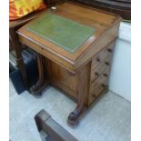 A late Victorian walnut Davenport,