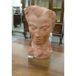 After DM Thropp - a terracotta coloured moulded plaster bust,