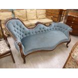 A late Victorian style mahogany floral, foliate and scroll carved, showwood framed settee,