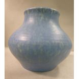 An ET Radford Royal Lancastrian speckled yellow on pale blue pottery vase of squat,