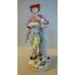 A mid 19thC English porcelain figure, a young man wearing a frockcoat and breeches,