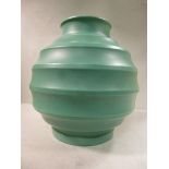 A Keith Murray Wedgwood pottery, jade green, satin glazed and moulded,