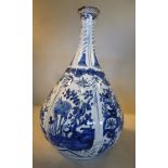 A late 18thC Dutch Delft onion shaped bottle vase,