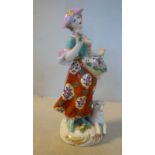A mid 19thC English porcelain figure, a young woman with flowers in her pinafore,