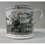 An early 19thC earthenware mug,