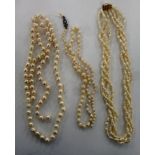 Three similar cultured pearl necklaces of various form 11