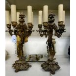 A pair of mid 20thC rococo design gilt metal five branch candelabra with candle effect sconces 17.