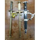 Three replica German WWII daggers the blades 10''L in sheaths OS3