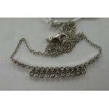 An 18ct white gold fine necklace,