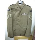 A Royal Flying Corps khaki coloured Sergeants tunic with embroidered emblems bears the label of C