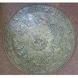 An early 20thC Continental cast and chased copper finished wall plaque,