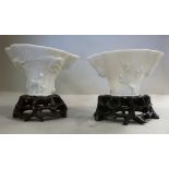 Two 19thC Chinese blanc-de-chine porcelain libation cups of oval, tapered form,