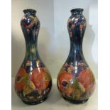 A pair of Moorcroft pottery gourd shaped vases,