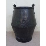 An early 19thC rivetted black painted metal coal bucket of waisted,