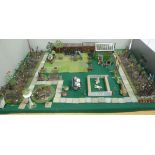 An early 20thC miniature Britains painted diecast lead model park garden,