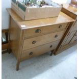 A mid 20thC light oak dressing table with provision for a mirror,