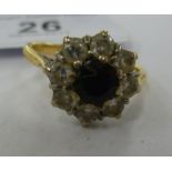 A gold coloured metal sapphire and diamond cluster ring 11