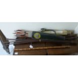 A mixed lot: to include a stitched bottle green hide quiver and various arrows;