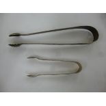 A pair of Georgian silver bright cut engraved sugar tongs;