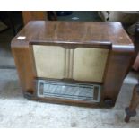 A mid 20thC French La Radiophonie Normande walnut cased wireless with a speaker panel waveband