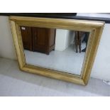 A mirror set in a wide moulded gilt framed 29'' x 38'' SL