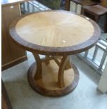 A Richard Williams burr walnut and oak centre table, having a segmented veneered top,