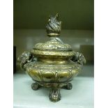 A late 19th/early 20thC decoratively cast brass inkwell,