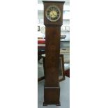 A 1930s figured walnut veneered cased grandmother clock, having a cube shaped hood,