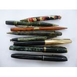 Writing equipment: to include two Parker fountain pens;