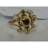 A 9ct gold ring with a ruby,