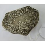 An 'antique' Continental silver coloured metal trinket box of serpentine design,