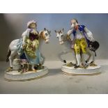 A pair of late 19thC Continental porcelain figures, a young man and woman,