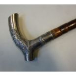 A late 19th/early 20thC Sino-European walking cane, the tapered wooden shaft with an applied,