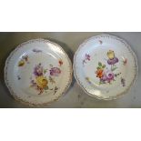 A pair of early 20thC Meissen porcelain wavy edged plates,