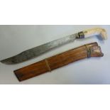 An early 20thC Indian machete, having a carved bone handle the blade 15.