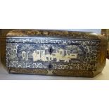 A late 19thC Sino-European black lacquered and gilt painted work box of elongated, octagonal form,