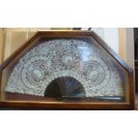 A late 19thC embroidered lace fan with simulated tortoiseshell sticks and guards 9''L in a later