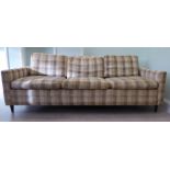 A 1960s Flaks bed settee with a low, level back and straight arms,