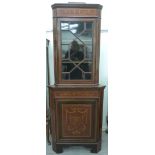 An Edwardian mahogany and satinwood inlaid standing corner cabinet with marquetry ornament,