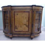 A late Victorian figured walnut, ebonised marquetry and gilt metal mounted credenza,