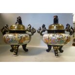 A pair of 20thC Japanese Satsuma earthenware censer design vases with domed covers,