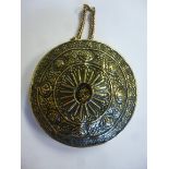 A 19thC Tibetan/Chinese bronze and copper gau, the domed cover and shallow base,