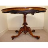 An early Victorian walnut loo table, the figured,