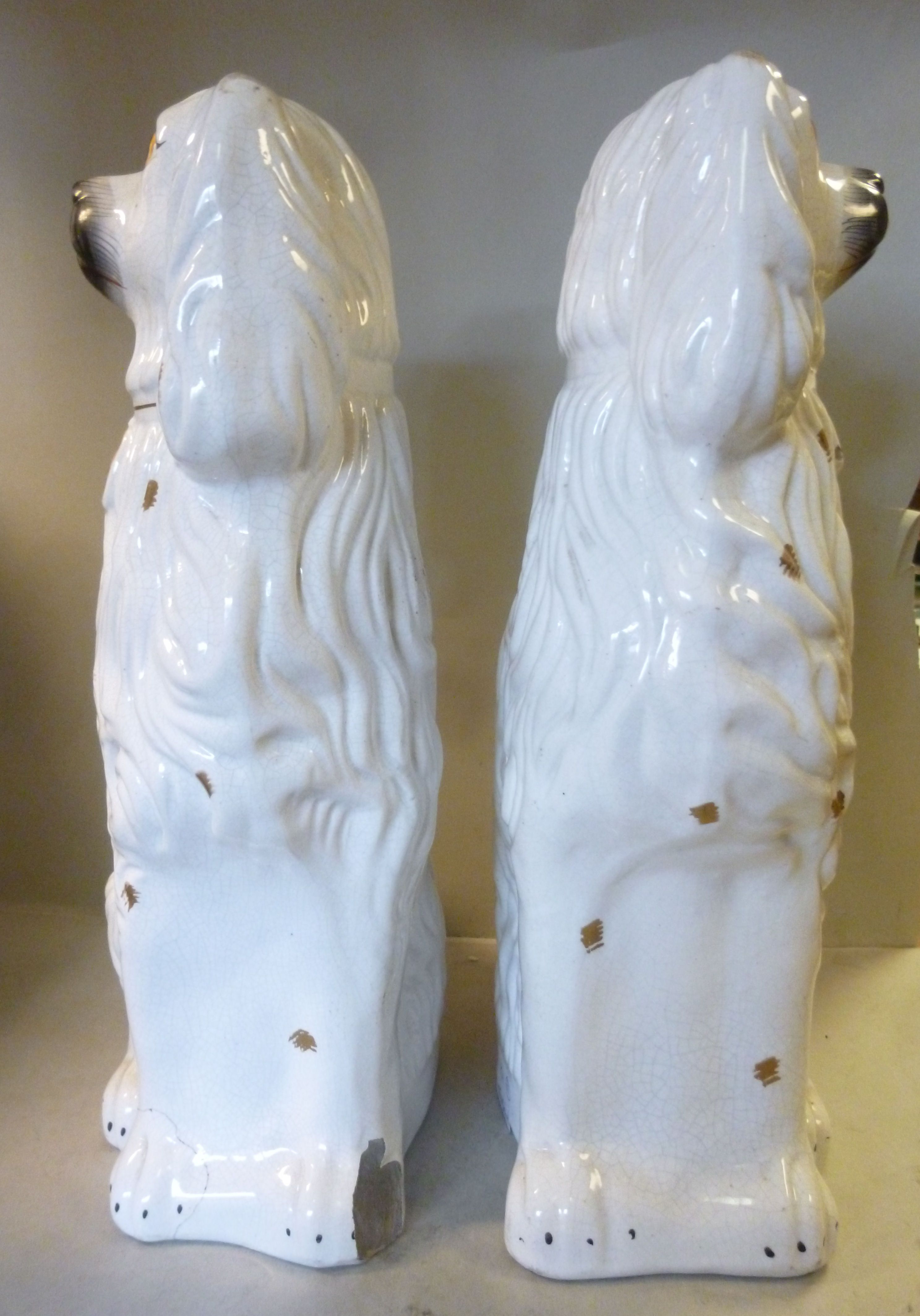 A pair of late Victorian Staffordshire ivory glazed pottery seated King Charles Spaniels with - Image 3 of 6